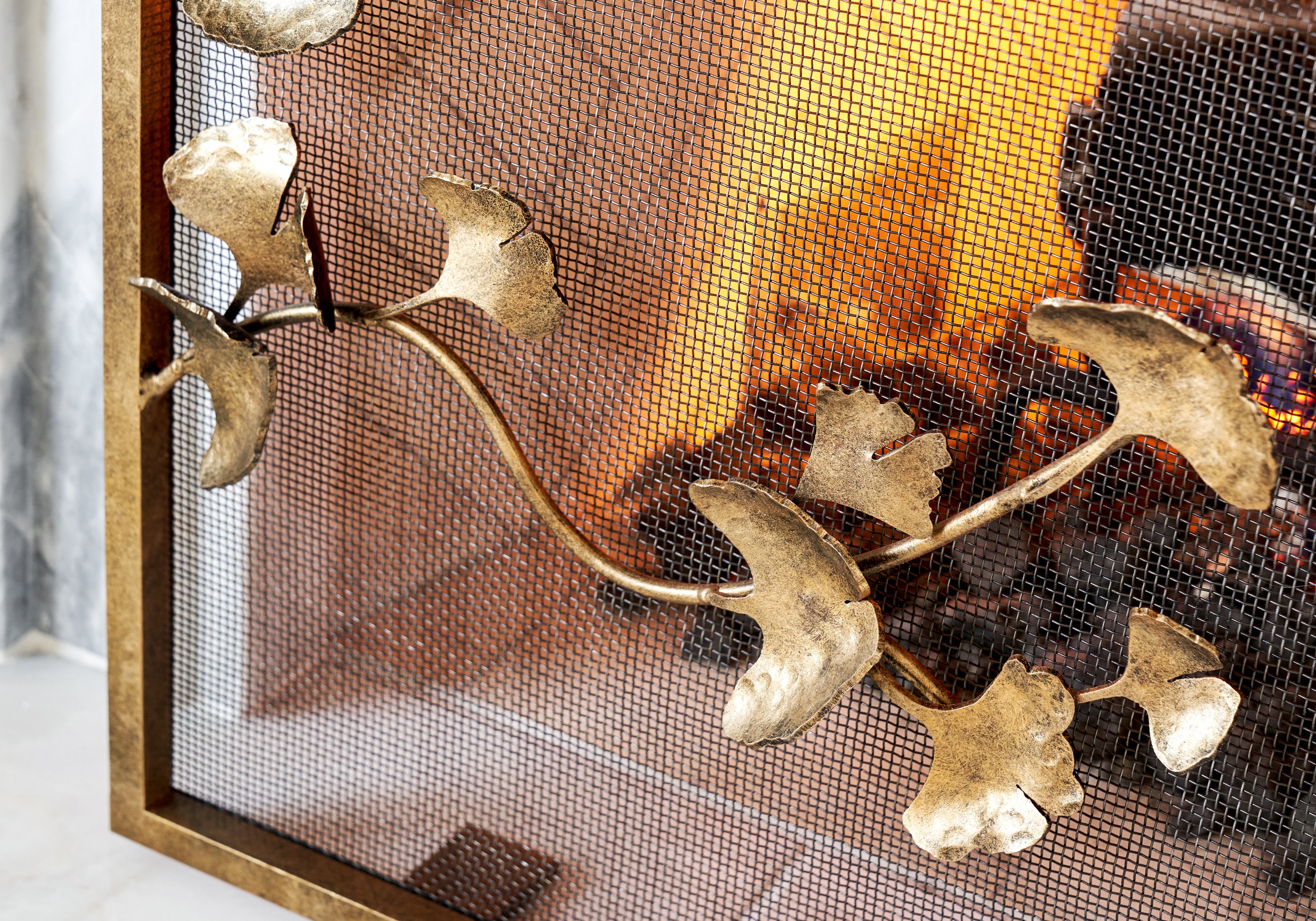 Ginkgo Fire Screen painted in an antique gold finish