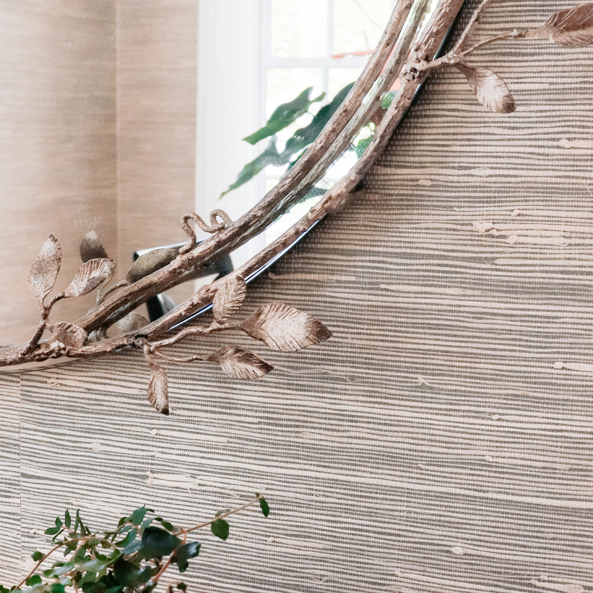 Lennox Mirror installed against a textured wall