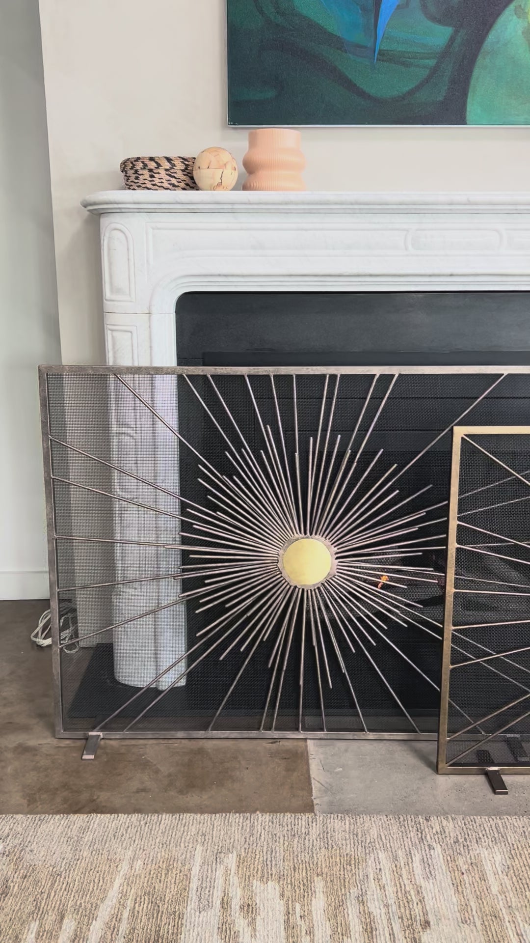 Load video: Sunburst Fireplace Screen